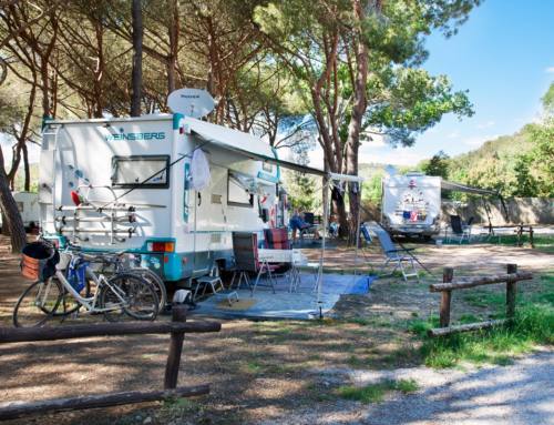 At the beach on holiday with the camper